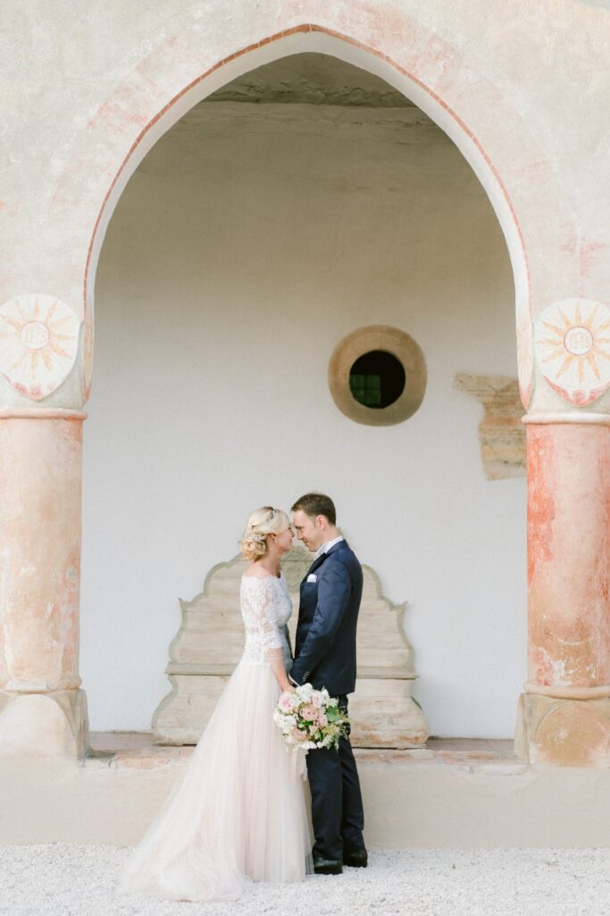 bride and groom after their fairytale wedding ceremony in italy planned by atelier crespi wedding planner italia