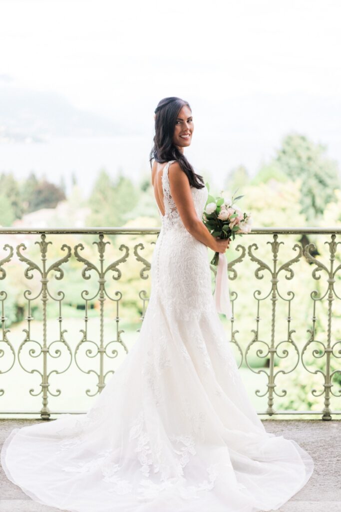 bride with aline wedding lace dress before her lake como wedding ceremony planner by destination wedding planner atelier crespi