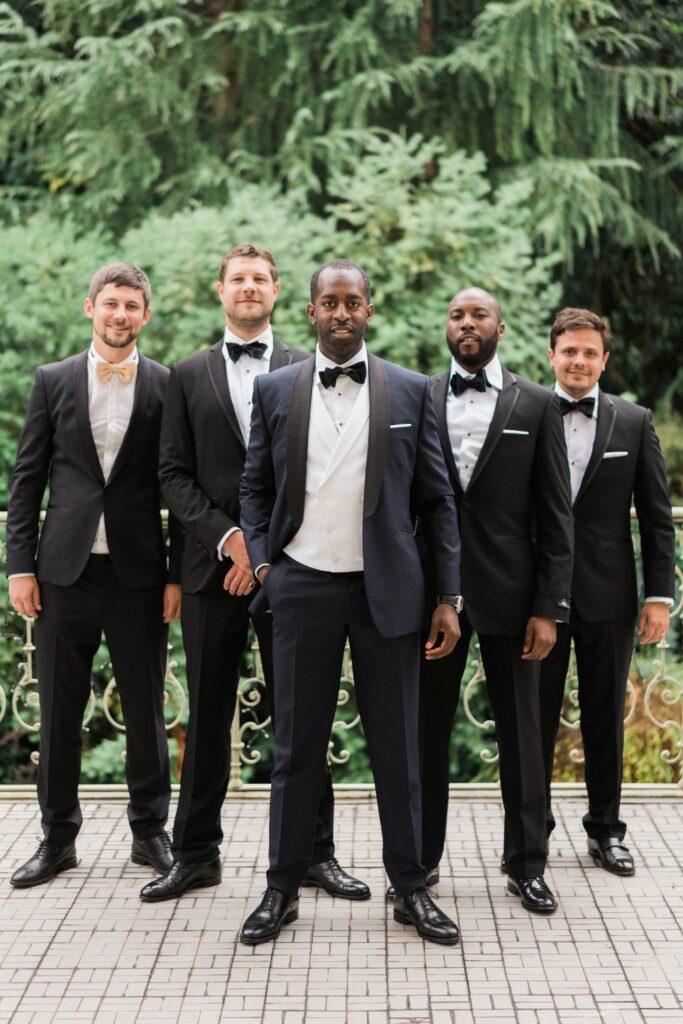 groomsquad wiht tuxedos looking great before the wedding ceremony in lake como